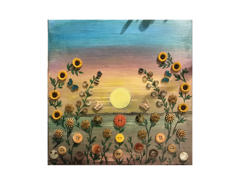 An example of awkward art with a sunset background and buttons in the shape of flowers.